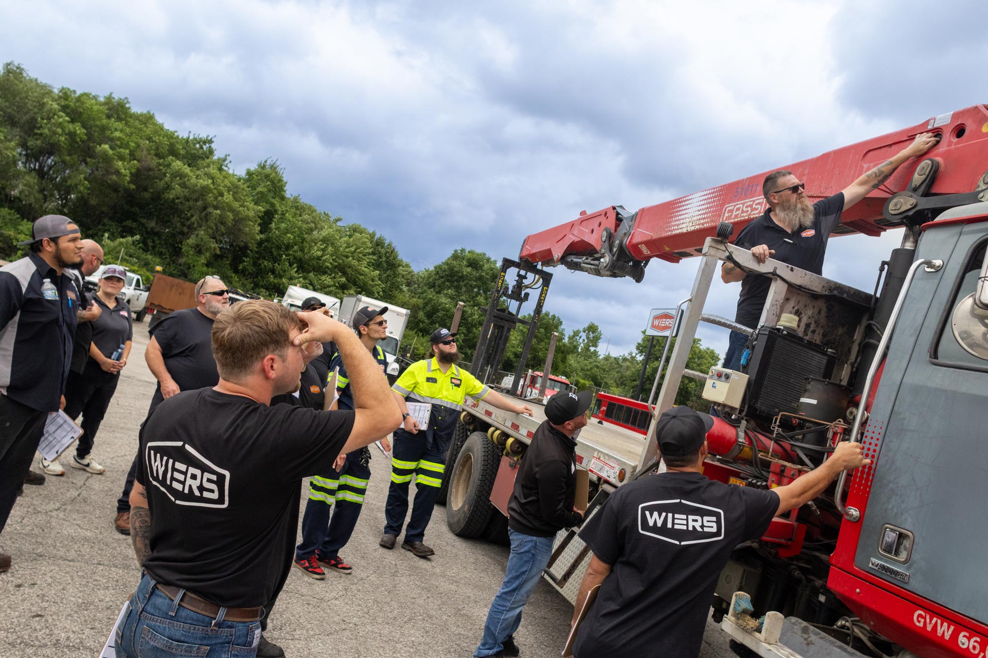 Tom leads a group of Wiers technicians in boom & crane training.